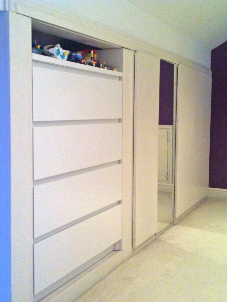 Malm drawers, wardrobe door, toy cupboard. Partitioning out the storage