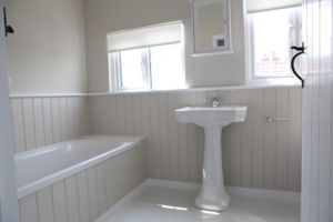 Like this, but just the bath side - so much more solid than a bath panel